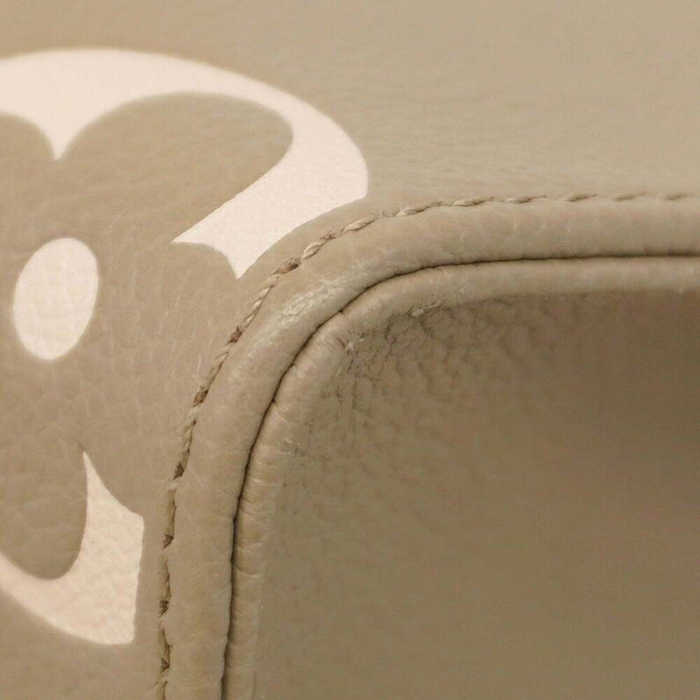 Louis Vuitton Monogram Empreinte Bicolor OnTheGo BB Handbag M47054 Tourtrell ... - Picture 6 of 10